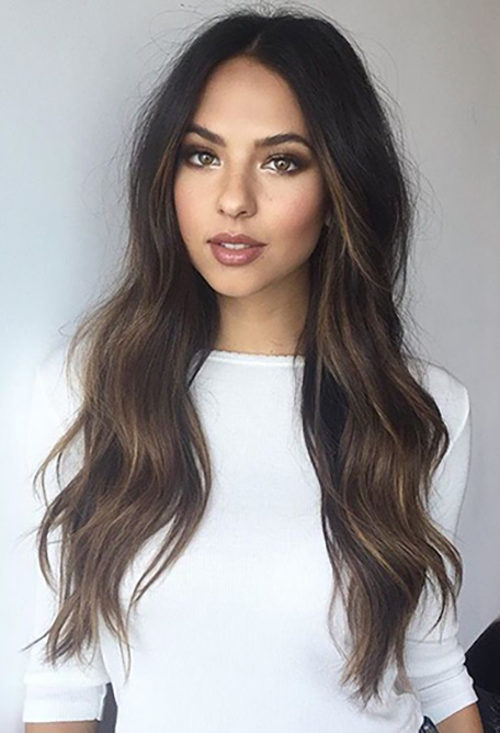 Long dark hair with thin highlights